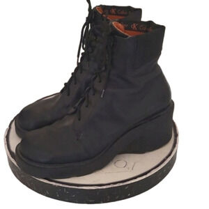 - Calvin Klein Leather lace up front Combat Boots